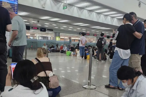 Exhausted passengers waiting in long immigration lines at major airports